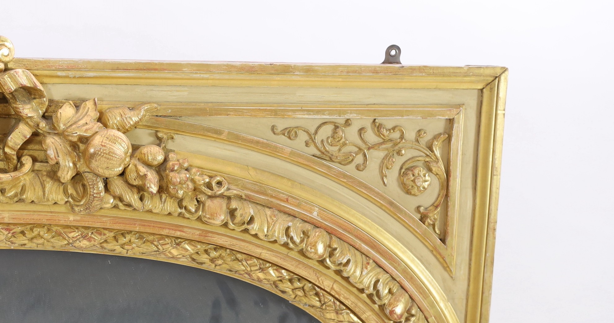 A late 19th century French carved giltwood wall mirror, W.146cm H.171cm